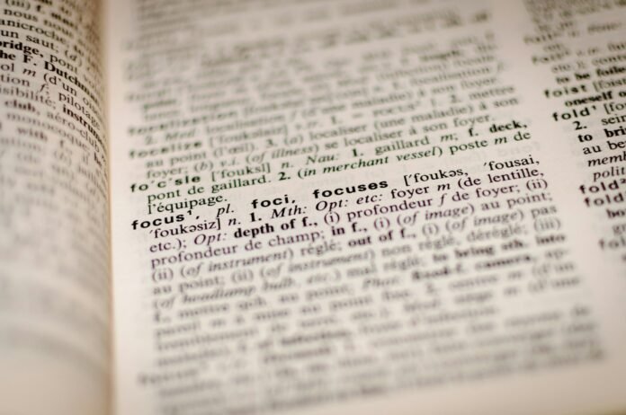 Close-up of a dictionary page, representing decoding Nigeria's inflation terminology