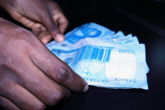 Nigerian naira banknotes, representing the cost-of-living impact of Nigeria's inflation rate